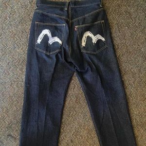 size 34 dark wash low rise baggy jeans